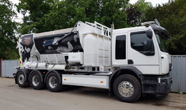 truck loaded with on site mixed concrete on its way to the construction site